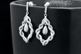 Sterling Silver Floral Vintage Style Braided Curved Flower Post Earrings